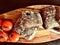 Ciabatta and tomatoes on wood plate