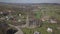 Cieklin, Poland - 7 7 2019: Roman Catholic Church in the center of a picturesque village located on green hills. Aerial drone or q