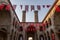 Cifte minareli double minaret old school with Turkish flags in Erzurum, Turkey