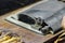 A cigar rolling machine Inside a cigar factory. Traditional manufacture of cigars at the tobacco factory. Making a cigar fromA cig