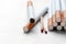 Cigarettes and match on white paper background.