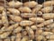 Cilembu honey sweet potato is ripe, crispy and soft to eat, Indonesian tropical Cilembu sweet potato. Sold in wire baskets.