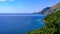 Cilento coast, Scario. Campania, Italy. View of the azure sea, coast and boat