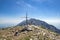 Cima delle Pozzette, wooden cross on the top of a mountain, hiking trail Alta Via del Monte Baldo