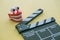 Cinema clapperboard with chattering teeth toy on yellow wooden background - Funny, comedy or humor movie style, film industry