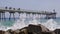 Cinema-graph of Footbridge over the sea with people walking.Time Lapse.