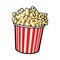 Cinema popcorn in a big red and white striped bucket