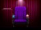 Cinema seat.Theater seat on curtain with spotlight background