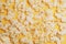 Cinema session, film, popcorn, 3D glasses. View movie concept, discounts. Background of yellow popcorn. Close-up popcorn on a