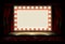 Cinema or theatre with style light bulb sign