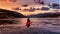 Cinemagraph Continuous Loop Animation. Adventurous Girl Paddling on a Bright Red Kayak
