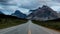 Cinemagraph continuous loop animation of scenic road in Canadian Rockies