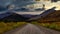 Cinemagraph Continuous Loop Animation. View of Scenic Road, Trees and Mountains