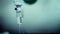 Cinemagraph of a fluid intravenous saline drip in a hospital room