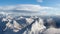 Cinemagraph Loop Animation. Aerial Panoramic View of Canadian Mountain covered in snow.