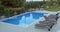 Cinemagraph - outdoor pool with empty chaise longues