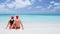 CINEMAGRAPH - seamless loop: Christmas couple in love on travel beach holidays