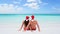 CINEMAGRAPH - seamless loop: Christmas couple in love on travel beach holidays