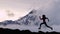 CINEMAGRAPH - seamless loop. Trail runner athlete silhouette running in mountain