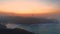 Cinematic aerial footage sunrise at the beach and lighthouse