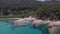 Cinematic aerial view of Isolated Golf Island in Thasos - Grecce, Aegean Sea