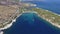 Cinematic aerial view of Isolated Golf Island in Thasos - Grecce, Aegean Sea