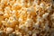 Cinematic allure popcorn kernels on a background create a visually appealing and textured scene