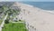 Cinematic concept of Beach sports at sandy Santa Monica beach background aerial