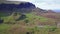 Cinematic flight over the Quiraing on the eastern face of Meall na Suiramach, Isle of Skye, Highland, Scotland