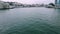 Cinematic flight past a snow-covered ship sailing on the sea. Winter sea.