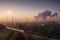 Cinematic image of air pollution smoke in air through industrial activities from a railway track at sunset, created with