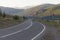 Cinematic landscape the road leaving for the mountains in the early morning