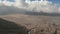 Cinematic shot aerial view of Pura Luhur Poten hindu temple near Mount Bromo volcano in East Java