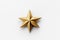 Cinematic Shot of a Single Gold Star on White Background.