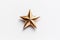 Cinematic Shot of a Single Gold Star on White Background.