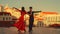 cing a Latin Dance Outside the City with Old Town in the Background. Sensual Dance by Two