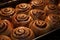 cinnamon buns in a baking pan