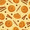 Cinnamon buns and cinnamon sticks seamless pattern. Cartoon vector illustration