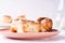 Cinnamon buns   in plate on morning table