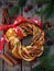 Cinnamon cocoa brown sugar wreath buns. Sweet Homemade christmas baking. Roll bread, spices, decoration on wooden background. New