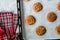 Cinnamon Cookies Snickerdoodle on Baking Paper with Oven Tray