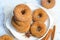 Cinnamon Donuts, Freshly Baked Doughnuts Covered in Sugar and Cinnamon Mixture