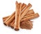 Cinnamon dried bark strips and cinnamon powder, sweet-smelling brown substance used in cooking, isolated on white background