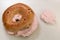 Cinnamon and raisin bagel with strawberry cream cheese spread