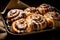 Cinnamon rolls pastries on baking tray