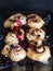 Cinnamon rolls with raspberries and blackcurrant,