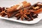 Cinnamon, staranise and cloves. winter spices on wooden table