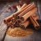 Cinnamon sticks and cinnamon powder on wooden table