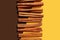 Cinnamon sticks on double background. Vanilla and chocolate concept. Deep yellow, brown. Topping for desserts, food. Natural