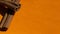 cinnamon sticks on an orange background close-up